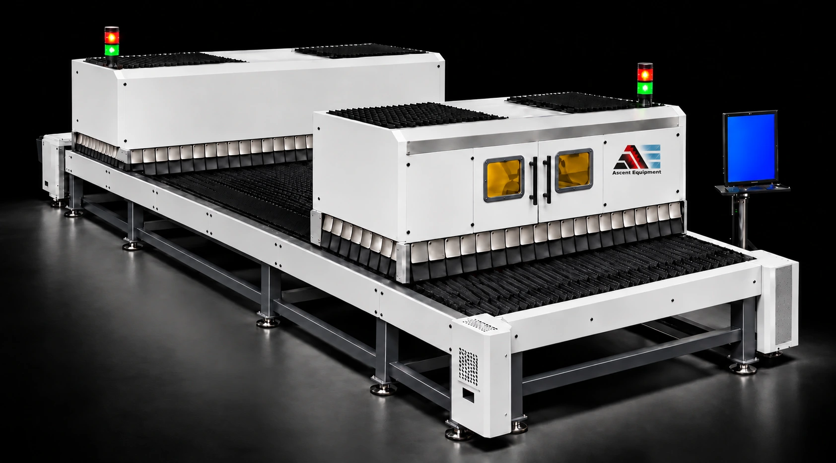 Dual gantry laser cutter with separate white gantry covers, viewing windows, lower protective skirts and an operator console