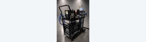 Ascent 2000W handheld laser welder on a mobile cart